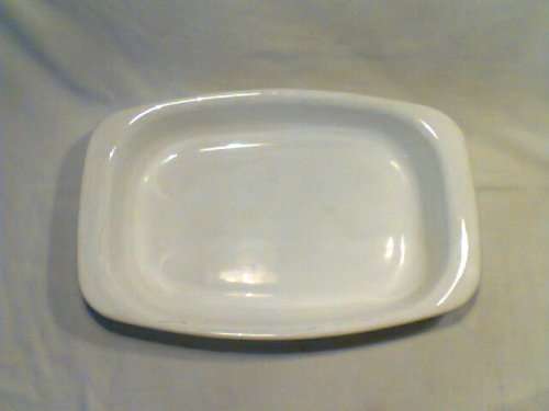 A first edition "CORNING WARE" roasting pan made in USA. Needs TLC. In good secondhand condition.