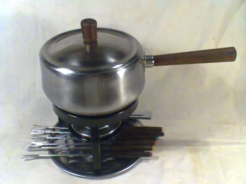 A Vintage old Fondue set complete with 6 forks & Tray All pieces marked L van Rensburg. Ready to use