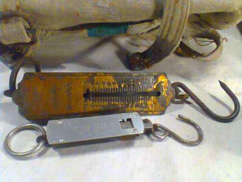 A Old Fisher Man's Vintage Rucksack with old reel & lead weight mold,2 x Pocket Scales bits & pieces