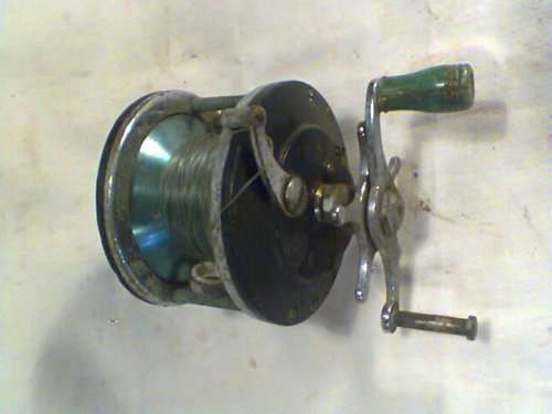 A Old Fisher Man's Vintage Rucksack with old reel & lead weight mold,2 x Pocket Scales bits & pieces