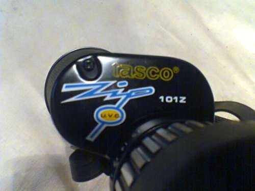 A Old " Tasco " binocular set In a case 7X-15 325Ft @ 1000yrd's With Strap & Needs a little TLC.