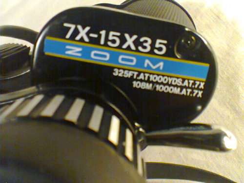 A Old " Tasco " binocular set In a case 7X-15 325Ft @ 1000yrd's With Strap & Needs a little TLC.