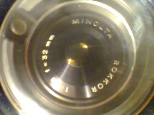 A Rare 32mm "Minolta" 24 Rapid with Rokkor Lens Camera in Leather case. In good d S/hand condition.
