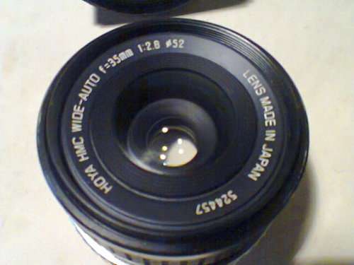 Old Pentax plus it has 3 different lenses to fit it & 2 Flashes.In good used second hand condition.