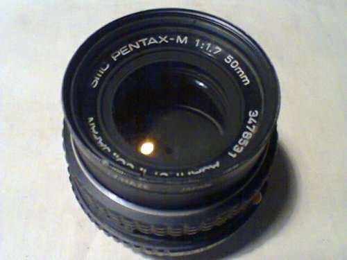 Old Pentax plus it has 3 different lenses to fit it & 2 Flashes.In good used second hand condition.