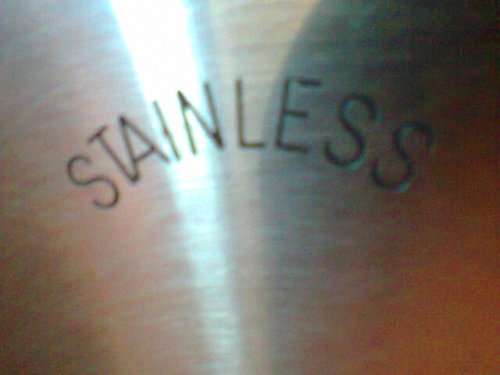 ENAMEL Scares Vintage "Pineware Stainless steel Blade" Bread cutter. In good second hand Condition.