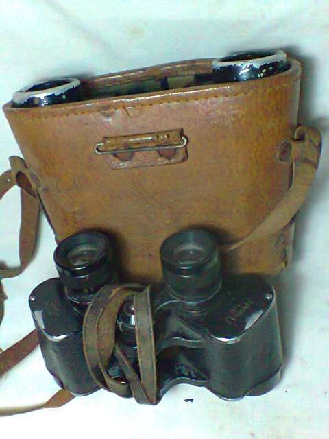 A Job lot . "Magnivu & Hilka" 2 x Binoculars both in need of repair. In used second hand condition.