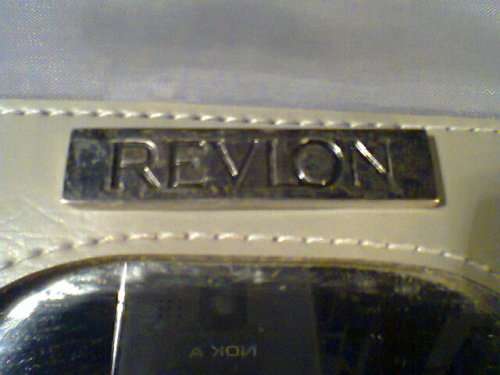 A Large Vintage Ladies "Revlon" Vanity case with satin lined & Zips.In good second hand condition.