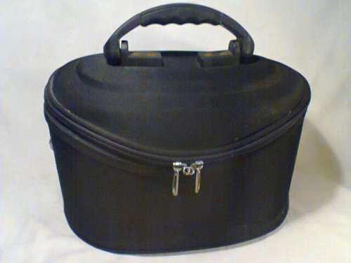 A Large Vintage Ladies "Revlon" Vanity case with satin lined & Zips.In good second hand condition.