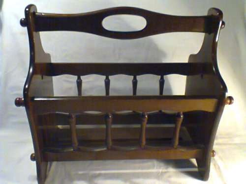 A Vintage Magazine rack in outstanding condition. Ideal for display in the lounge.Size:44cm L 39H