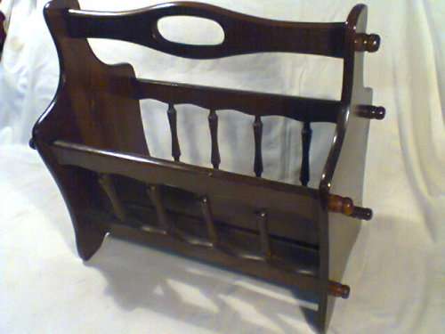 A Vintage Magazine rack in outstanding condition. Ideal for display in the lounge.Size:44cm L 39H