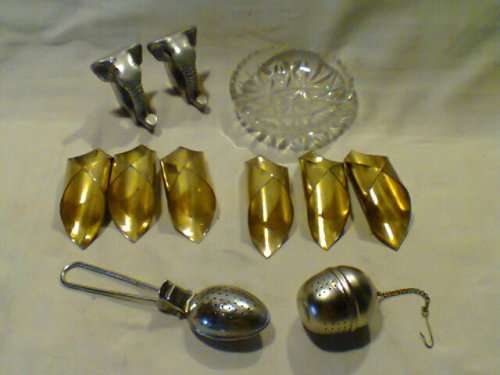 Collectible Lot of Tea Sieves 8 x Serviette Rings + Cut Glass Pin Bowl. All in good S/Hand and Used.