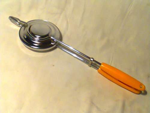 This is for the Collector.A yellow grip Jaffle sandwich Toaster, in good used second hand Condition.