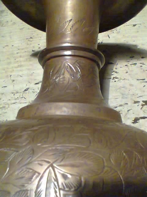 A Large Indian Brass Ornamental Vase's with designs.In good used condition and Size: 460mm Tall