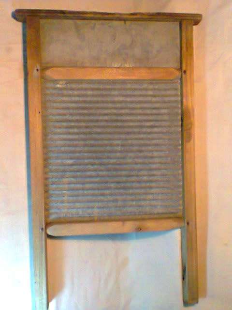 1920's The first man made washing machine, it's done a lot of hours & still going strong.