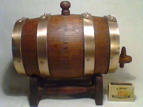 A Salesman's Sample Rare Wine Vat in Oak Brass Straps on stand complete with Tap & Plug.Neat order.