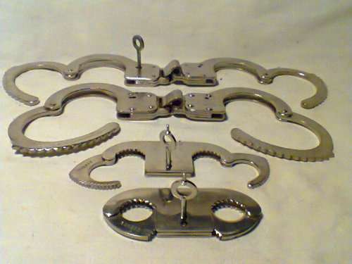 For the Collector of unusual Things. A Vintage set of 4 Hand/Thumb Cuff's with some Key's. As used.