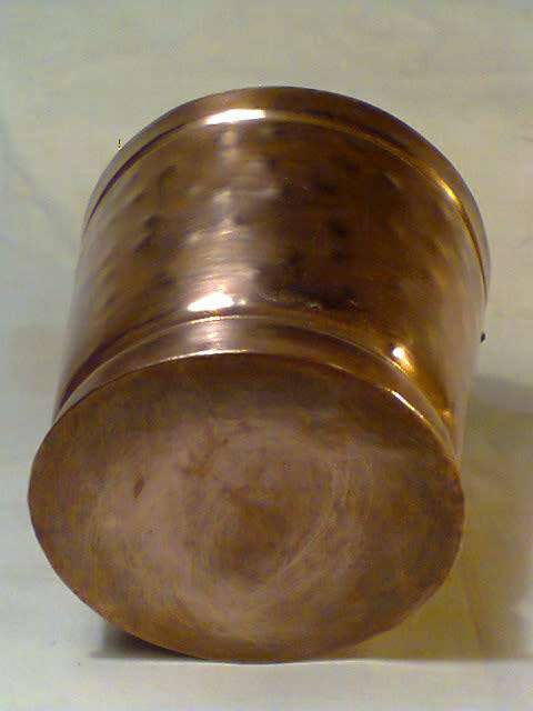 A Hand Beaten 1 litre Copper Bucket checked no leaks. In good condition. Sold as used in second hand