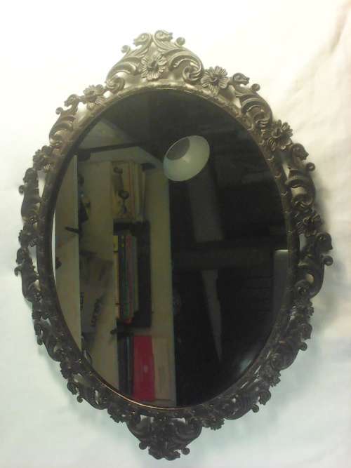 A Italian bronze framed Vintage Oval Mirror Size:400mm Tall x 300mm Wide.In used Second hand Order