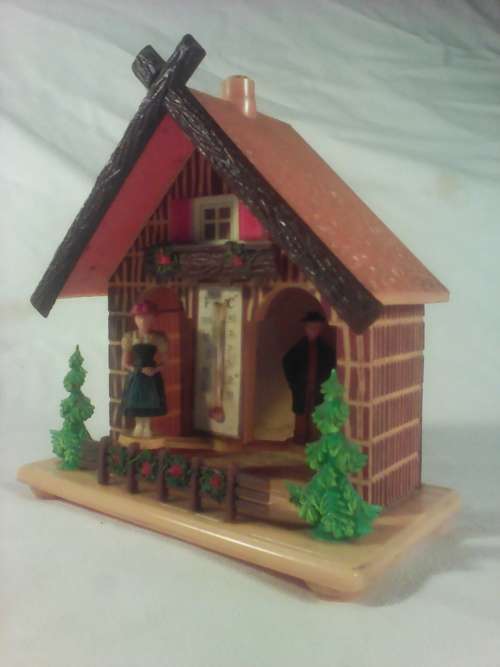 A Rare Classic. " Toggili" Weather House. working with instructions on how to operate on the back