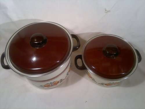 2 Pots. 1 very Large Brown Enamel heavy base Cooking + 1 Medium Pots. A Gift that was seldom used.