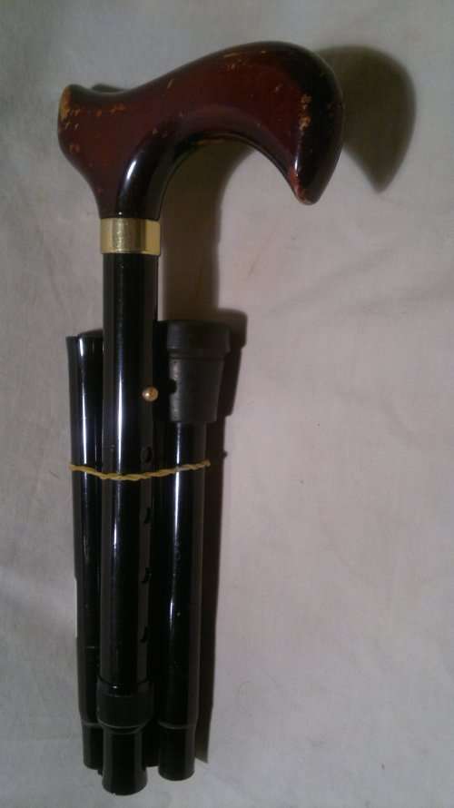 Wow a Steel folding walking, ideal to store in the pocket. Size: 300mm when folded-up & 910mm Total