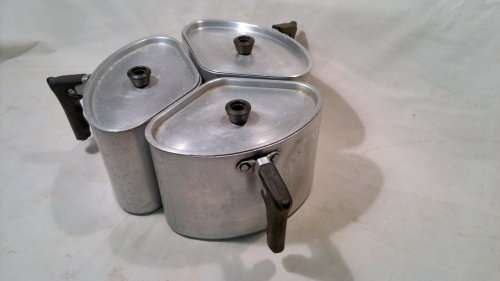 Vintage 3 Hart 1/3 Aluminum Lidded Pots from a Old Swartberg Farm House.All in good used condition.