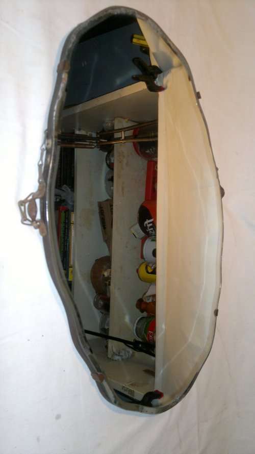 A Vintage Dressing table Beveled Mirror rigged up to hang on wall.Still has brackets plus chain on.