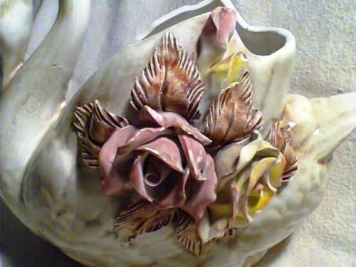 A Large Swan Vase with flower motif. Ideal for display in the lounge. In Fair to good condition.