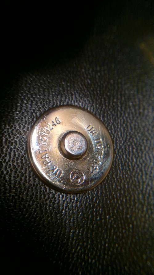 A Vintage " J. RENEE' " from an estate of a Opera singer. It's Hand made Genuine Snake.