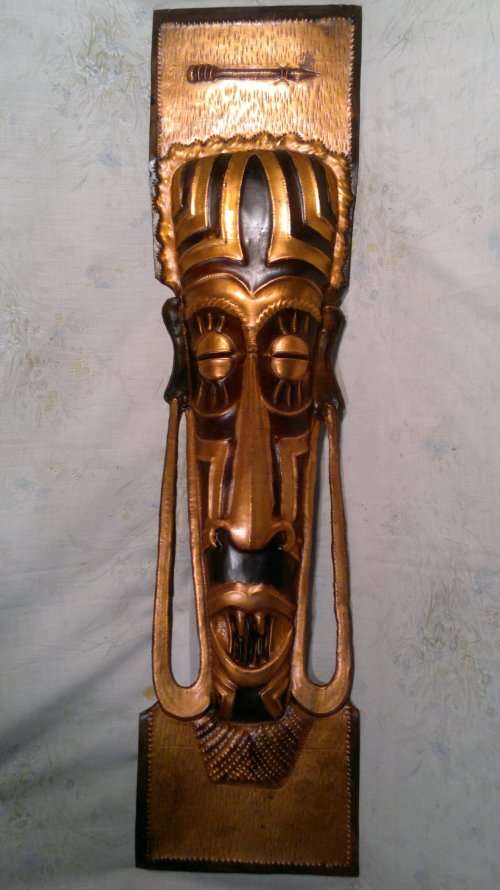 Hand made.Scarce African Ceremonial Heavy Copper Mask wall hanging and a `Cikwese` chopper.