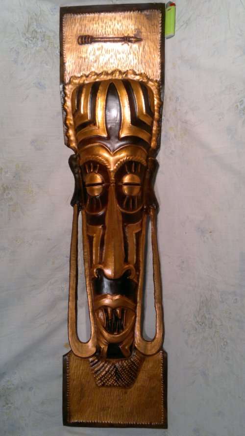 Hand made.Scarce African Ceremonial Heavy Copper Mask wall hanging and a `Cikwese` chopper.