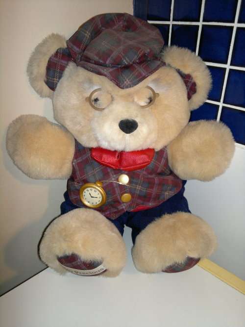 A Vintage Large big Teddy Bear with Eye Glasses and Watch for decor. Ideal gift for the small child.
