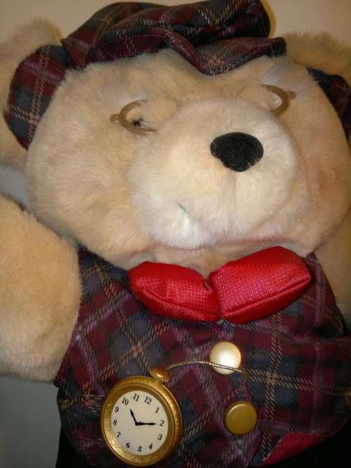 A Vintage Large big Teddy Bear with Eye Glasses and Watch for decor. Ideal gift for the small child.