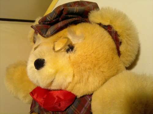 A Vintage Large big Teddy Bear with Eye Glasses and Watch for decor. Ideal gift for the small child.