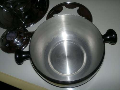 A all most new Stainless Steel Fondue Set with 6 color coded handle Forks. All in neat condition.