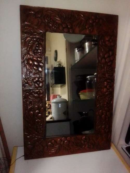 Bargain an impressive wall mirror . Hand beaten ornate copper wall mirror, 4 Angels on the corners .