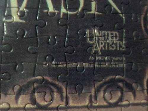 `The Man in the Iron Mask` staring Leonardo De Caprio Puzzel under glass in a solid wood frame.