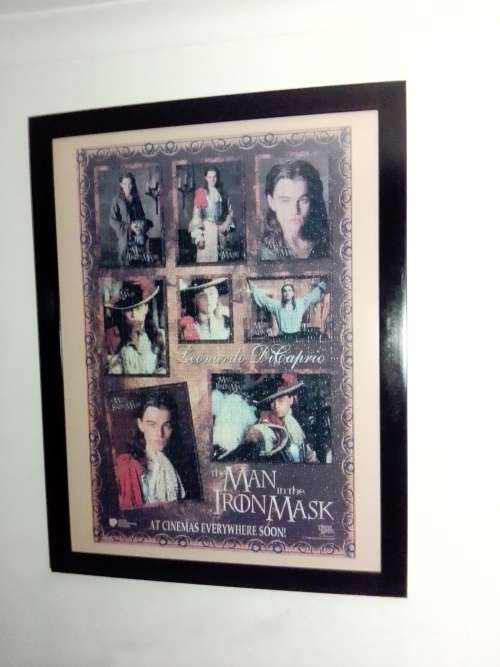 `The Man in the Iron Mask` staring Leonardo De Caprio Puzzel under glass in a solid wood frame.