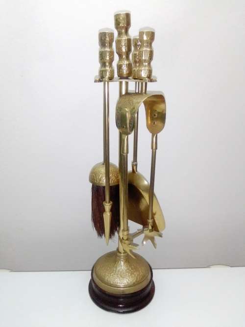 Ideal for that Rustick Fire place. Ornate & Heavy Solid Brass Fire Irons complete on matching stand.