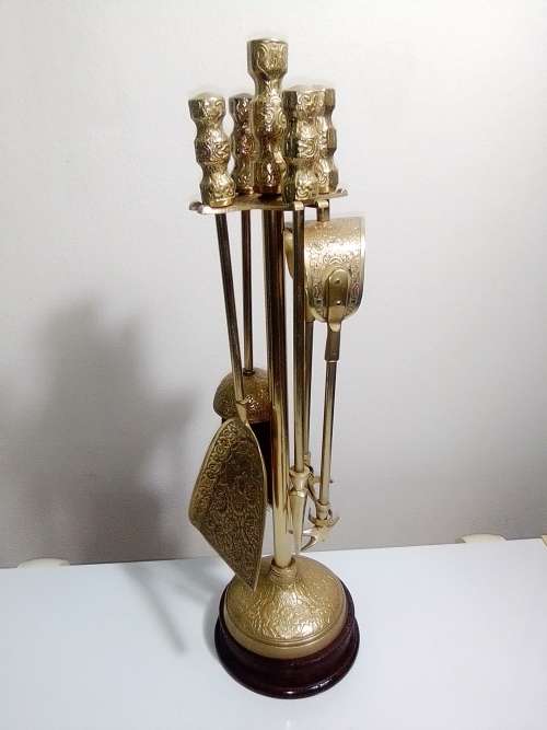 Ideal for that Rustick Fire place. Ornate & Heavy Solid Brass Fire Irons complete on matching stand.