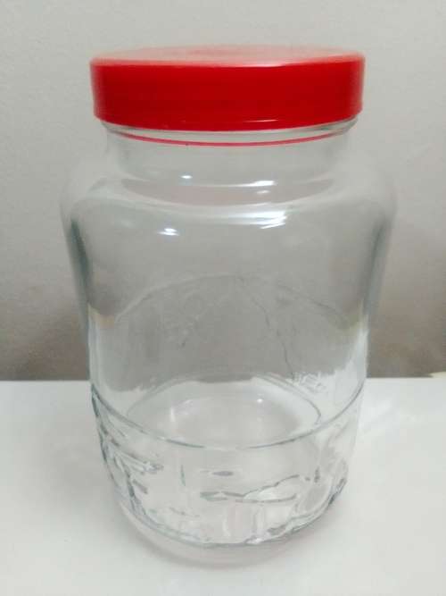 A Highly Collectible Large Red lidded INDONESIA GLASS BISCUIT CANDY APOTHECARY JAR.