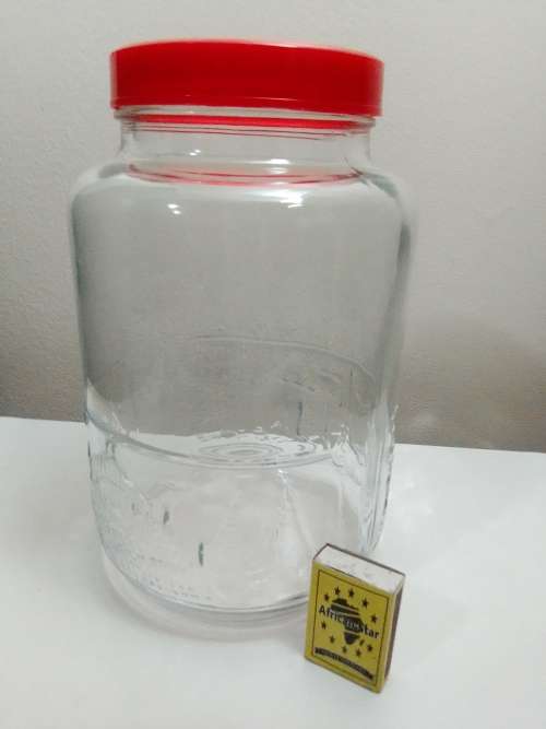 A Highly Collectible Large Red lidded INDONESIA GLASS BISCUIT CANDY APOTHECARY JAR.