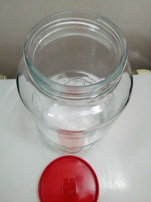 A Highly Collectible Large Red lidded INDONESIA GLASS BISCUIT CANDY APOTHECARY JAR.