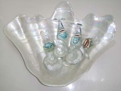 Large Glass Shell filled with NGWENYA glass Swaziland ornaments.Whales are special, Blue flack.