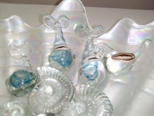 Large Glass Shell filled with NGWENYA glass Swaziland ornaments.Whales are special, Blue flack.