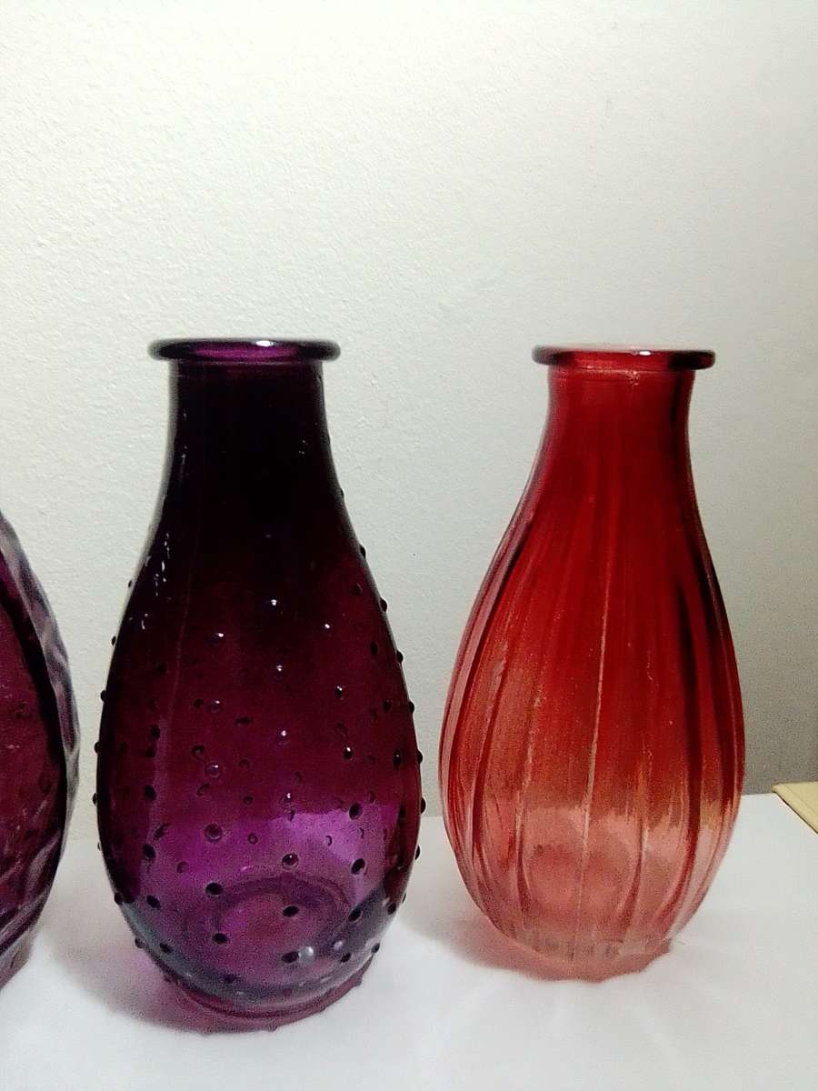 Reserved for "UNDER THE STAIRS" A Vintage collection of 4 Glass vases.