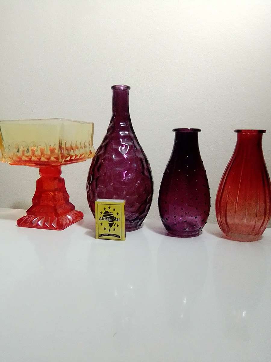 Reserved for "UNDER THE STAIRS" A Vintage collection of 4 Glass vases.
