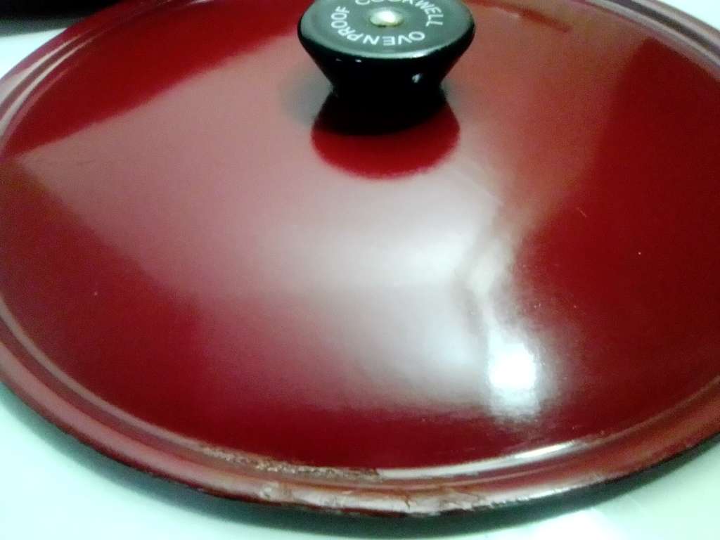 Vintage cast iron Cookwell Red enamel lidded long handle 26` Fry pan in good secondhand condition.