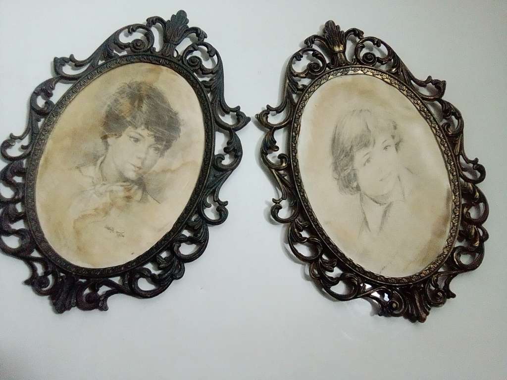 Ornate two photo frames. Both are Brass with Silk litho prints and stamped ITALY.